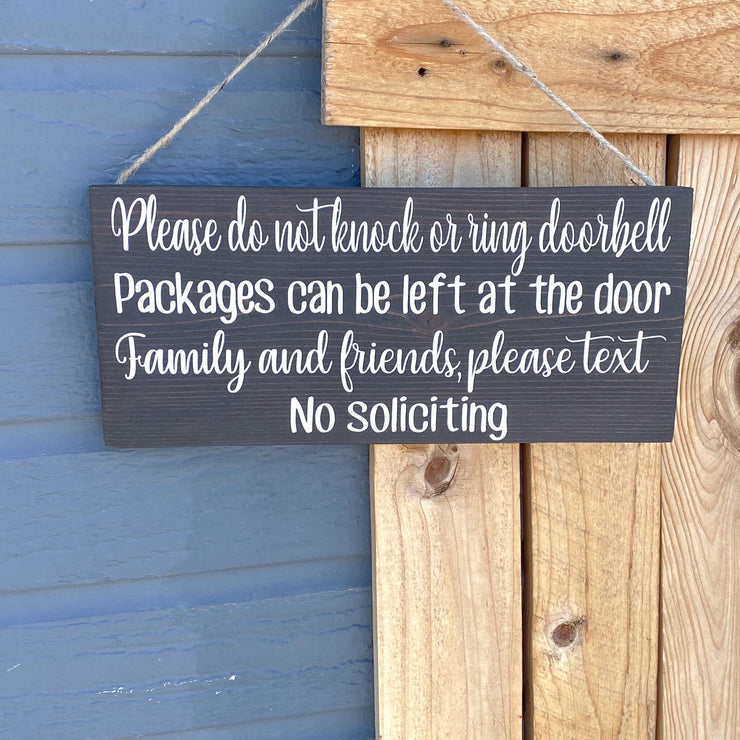 Please do not knock or ring doorbell sign / Packages can be left at the door / Family and Friends please text / No soliciting door sign