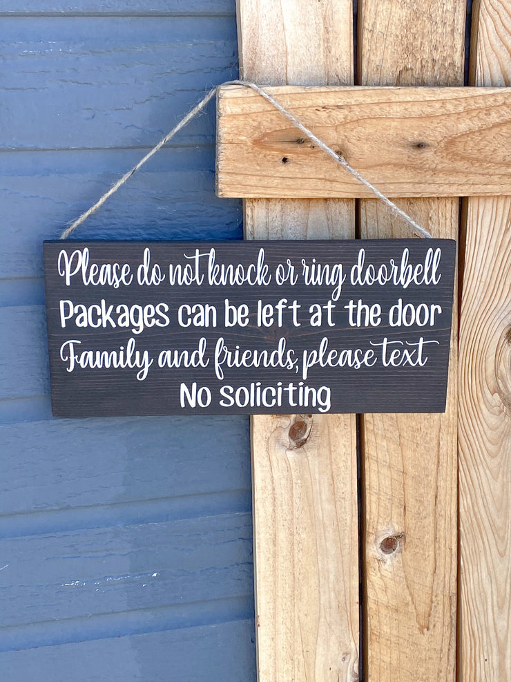 Please do not knock or ring doorbell sign / Packages can be left at the door / Family and Friends please text / No soliciting door sign