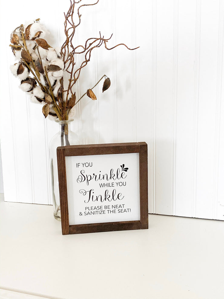 If you sprinkle when you tinkle please be neat and sanitize the seat framed wooden bathroom farmhouse sign. Cute framed bathroom sign decor