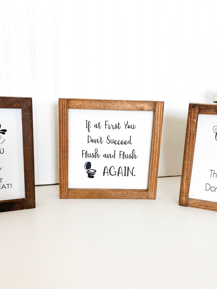 If at first you don't succeed, flush and flush again framed wooden bathroom sign. Cute framed bathroom sign decor. Farmhouse bathroom sign