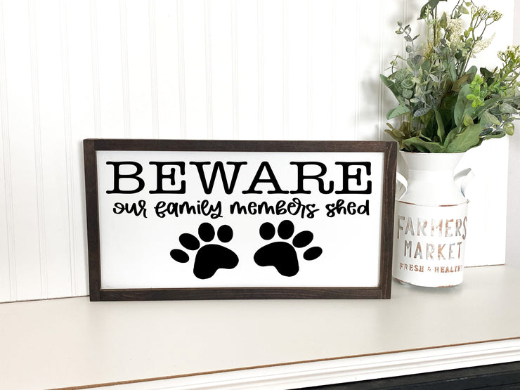 Beware our family members shed wood framed entryway sign / Front door wooden sign / Custom beware sign with paw prints / Funny framed sign