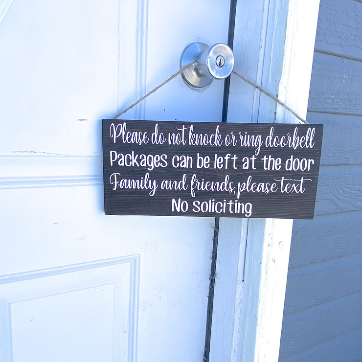 Please do not knock or ring doorbell sign / Packages can be left at the door / Family and Friends please text / No soliciting door sign