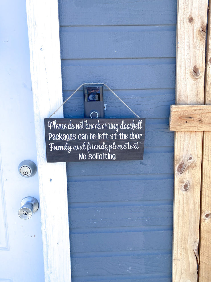 Please do not knock or ring doorbell sign / Packages can be left at the door / Family and Friends please text / No soliciting door sign