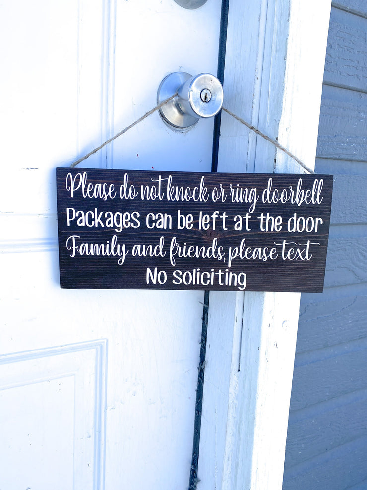 Please do not knock or ring doorbell sign / Packages can be left at the door / Family and Friends please text / No soliciting door sign